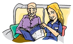 Careworker reading with service user